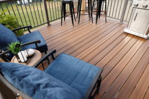 A composite deck with aluminum railing and furniture.