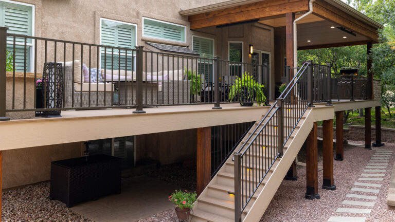 Outdoor living space with steel railing.