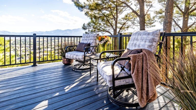 Balcony deck featuring easy to install aluminum railing and low-maintenance composite decking.